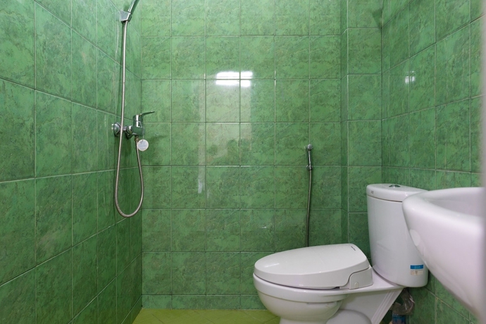 Imagen de la habitación del Hotel SPOT ON 2063 Bethania Residence. Foto 13