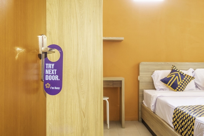 Imagen de la habitación del Hotel SPOT ON 2080 Rumah Kita Residence. Foto 2