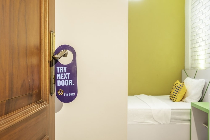 Imagen de la habitación del Hotel SPOT ON 2080 Rumah Kita Residence. Foto 4