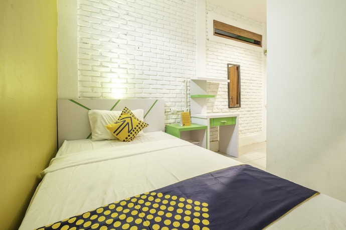 Imagen de la habitación del Hotel SPOT ON 2080 Rumah Kita Residence. Foto 6