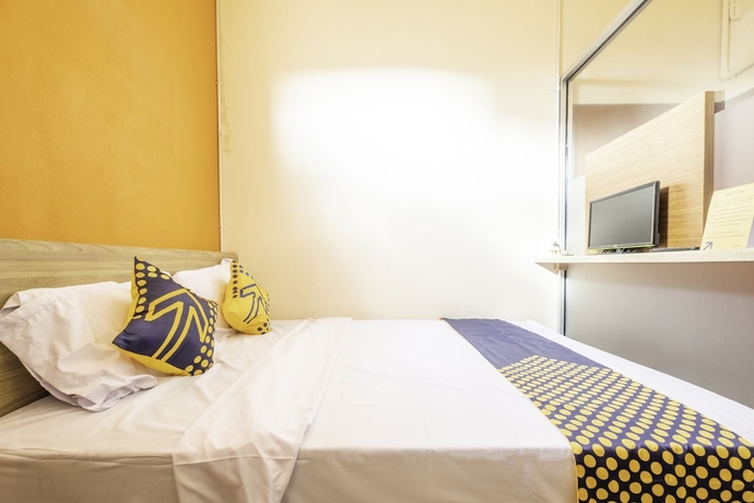 Imagen de la habitación del Hotel SPOT ON 2080 Rumah Kita Residence. Foto 12