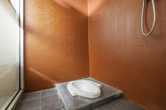 Imagen de la habitación del Hotel SPOT ON 2080 Rumah Kita Residence. Foto 16