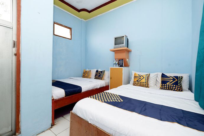 Imagen de la habitación del Hotel SPOT ON 2112 Homestay Lestari Dieng Syariah. Foto 3