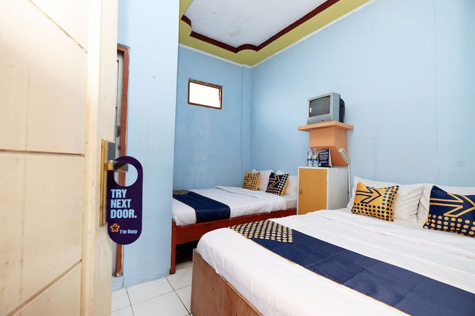 Imagen de la habitación del Hotel SPOT ON 2112 Homestay Lestari Dieng Syariah. Foto 5