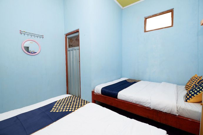 Imagen de la habitación del Hotel SPOT ON 2112 Homestay Lestari Dieng Syariah. Foto 6