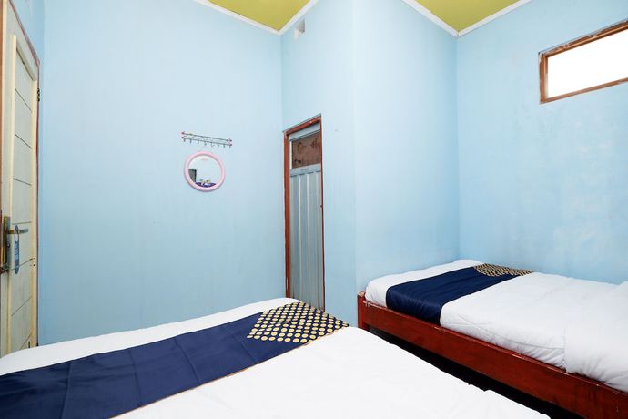 Imagen de la habitación del Hotel SPOT ON 2112 Homestay Lestari Dieng Syariah. Foto 8