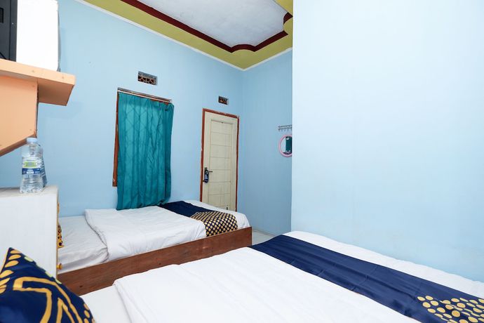 Imagen de la habitación del Hotel SPOT ON 2112 Homestay Lestari Dieng Syariah. Foto 9