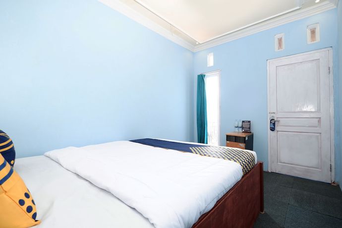 Imagen de la habitación del Hotel SPOT ON 2112 Homestay Lestari Dieng Syariah. Foto 10