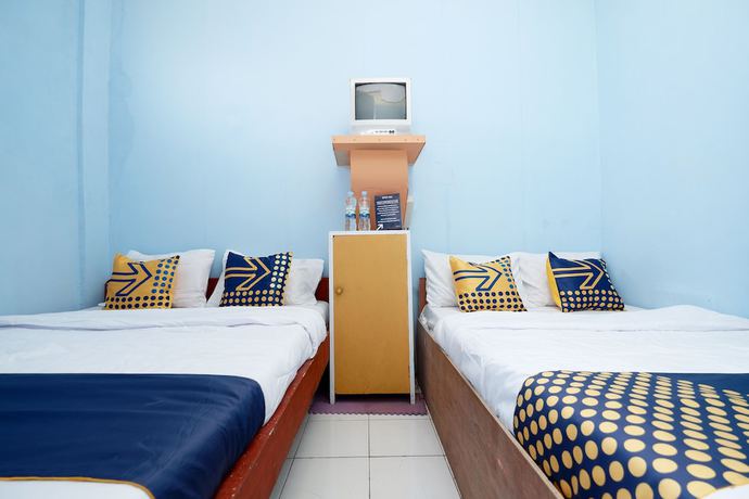 Imagen de la habitación del Hotel SPOT ON 2112 Homestay Lestari Dieng Syariah. Foto 11