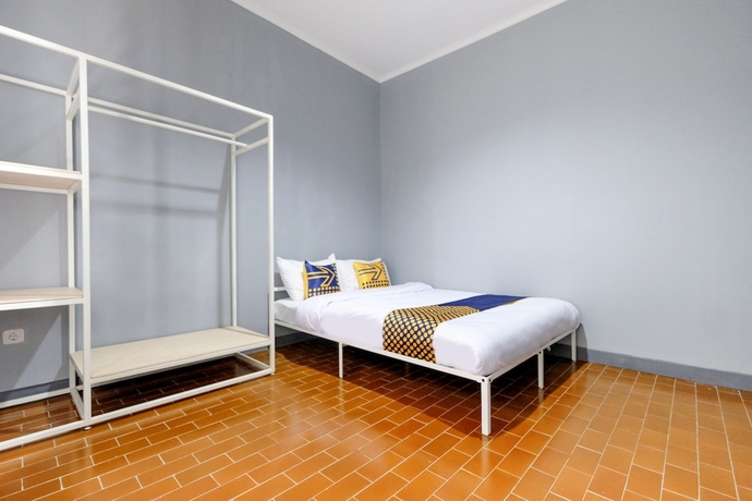 Imagen de la habitación del Hotel SPOT ON 2281 Omajo. Foto 2