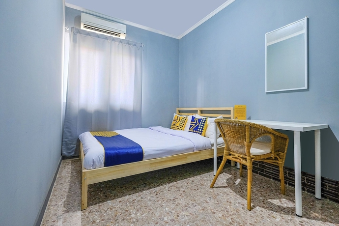 Imagen de la habitación del Hotel SPOT ON 2281 Omajo. Foto 5