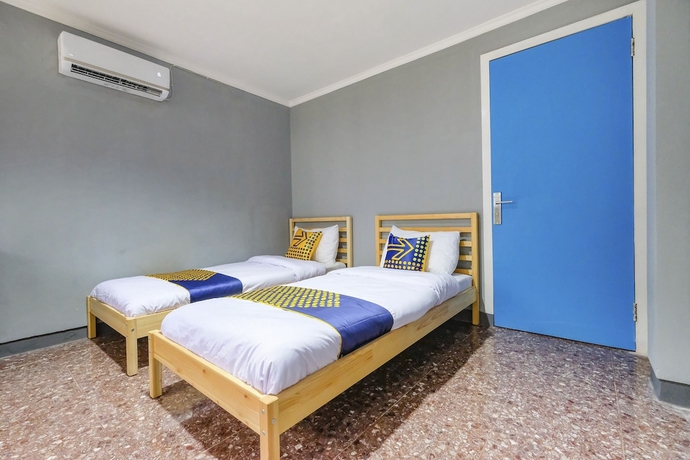 Imagen de la habitación del Hotel SPOT ON 2281 Omajo. Foto 9