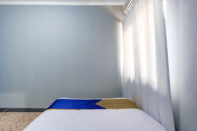 Imagen de la habitación del Hotel SPOT ON 2281 Omajo. Foto 16