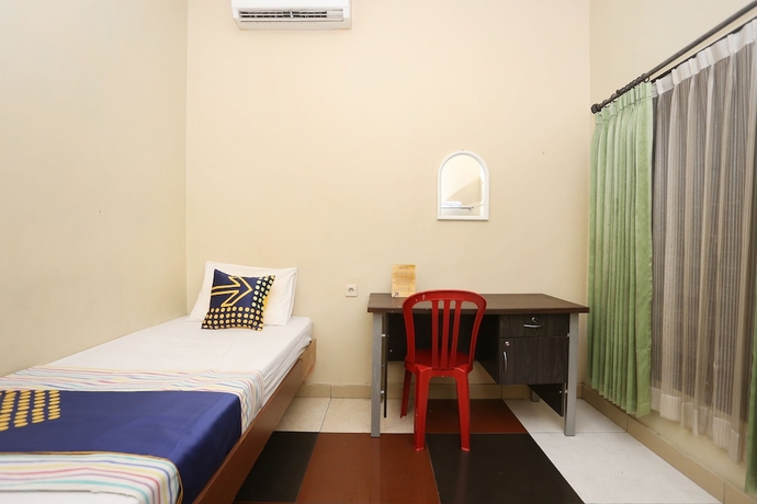 Imagen de la habitación del Hotel SPOT ON 2358 Aster Homestay. Foto 7