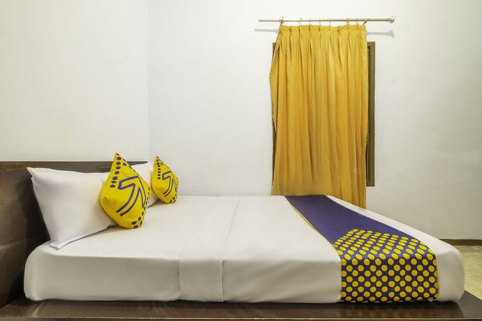 Imagen de la habitación del Hotel SPOT ON 2395 Aden 2 Syariah. Foto 5