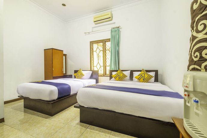 Imagen de la habitación del Hotel SPOT ON 2395 Aden 2 Syariah. Foto 8