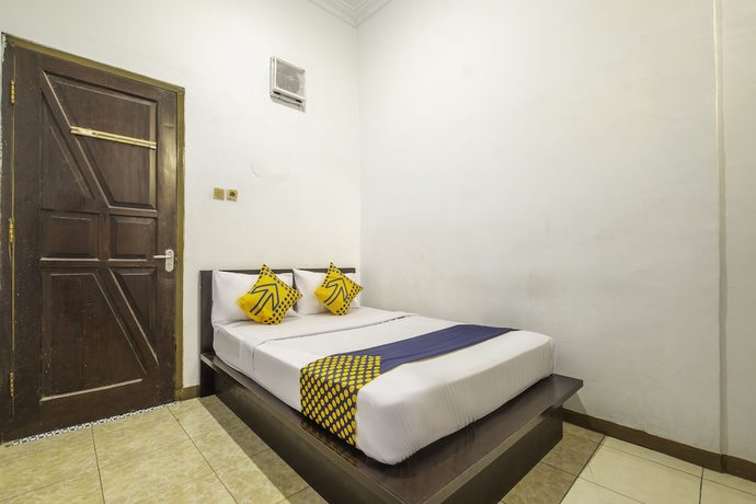 Imagen de la habitación del Hotel SPOT ON 2395 Aden 2 Syariah. Foto 13