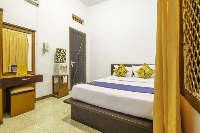 Imagen de la habitación del Hotel SPOT ON 2395 Aden 2 Syariah. Foto 15