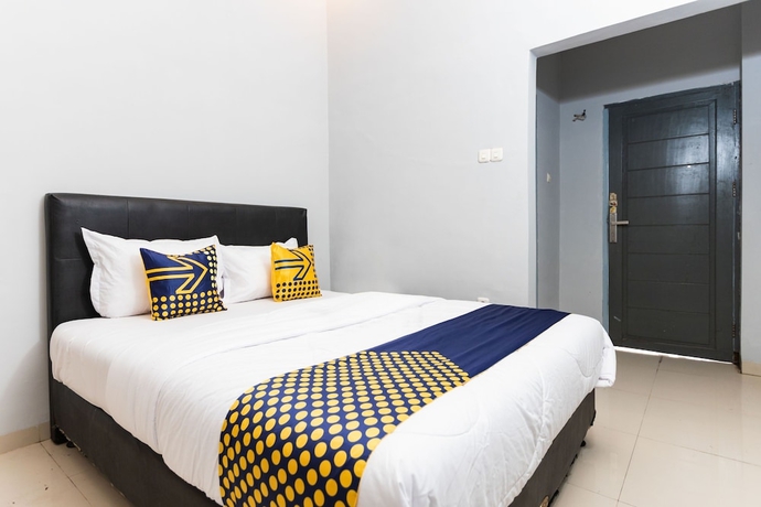 Imagen de la habitación del Hotel SPOT ON 2433 Pondok Akuanna. Foto 8