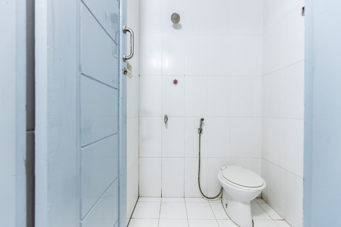 Imagen de la habitación del Hotel SPOT ON 2433 Pondok Akuanna. Foto 12