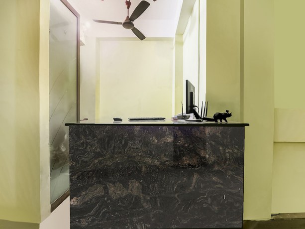 Imagen de los interiores del Hotel SPOT ON 26185 Spectra Inn. Foto 9
