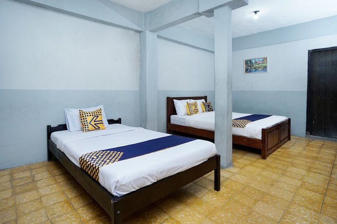 Imagen de la habitación del Hotel SPOT ON 2857 Pelangi. Foto 5