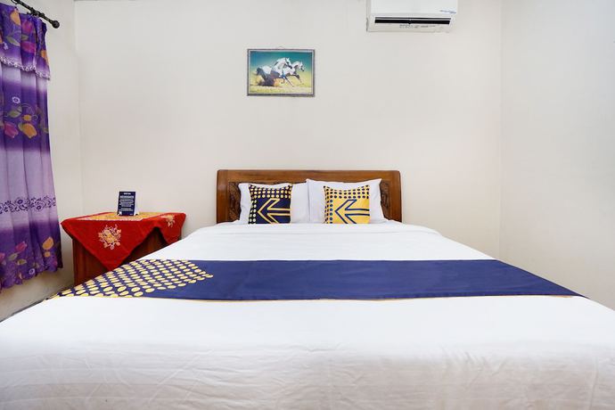 Imagen de la habitación del Hotel SPOT ON 2857 Pelangi. Foto 6