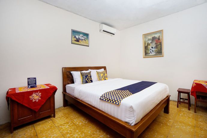 Imagen de la habitación del Hotel SPOT ON 2857 Pelangi. Foto 7
