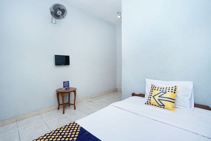Imagen de la habitación del Hotel SPOT ON 2857 Pelangi. Foto 10