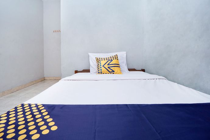 Imagen de la habitación del Hotel SPOT ON 2857 Pelangi. Foto 11