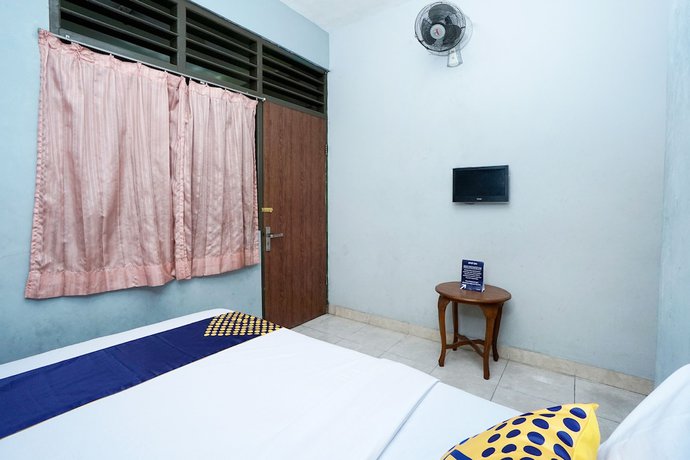 Imagen de la habitación del Hotel SPOT ON 2857 Pelangi. Foto 12