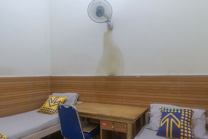 Imagen de la habitación del Hotel SPOT ON 3155 Penginapan Banyu Biru Syariah. Foto 10