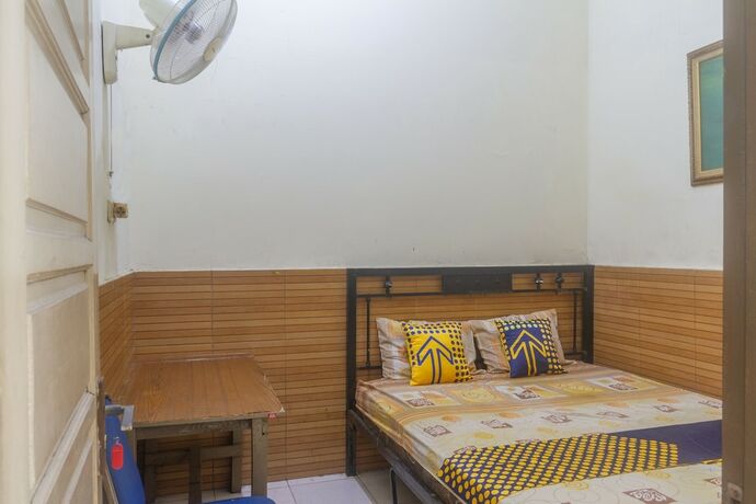 Imagen de la habitación del Hotel SPOT ON 3155 Penginapan Banyu Biru Syariah. Foto 12