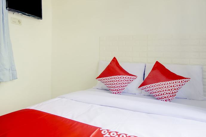 Imagen de la habitación del Hotel SPOT ON 3286 Ramania Residence Syariah. Foto 4