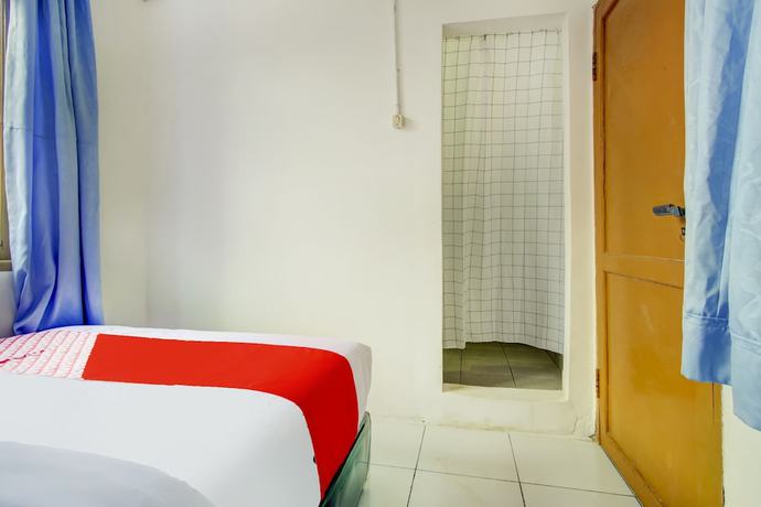 Imagen de la habitación del Hotel SPOT ON 3286 Ramania Residence Syariah. Foto 15