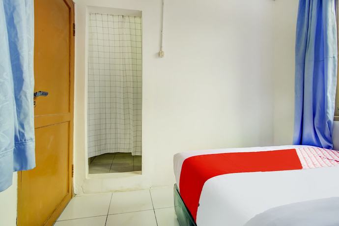 Imagen de la habitación del Hotel SPOT ON 3286 Ramania Residence Syariah. Foto 16