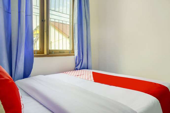 Imagen de la habitación del Hotel SPOT ON 3286 Ramania Residence Syariah. Foto 17