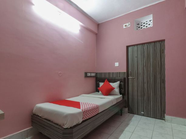 Imagen de la habitación del Hotel SPOT ON 35444 Nirmalya. Foto 10
