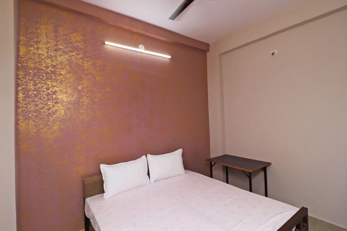 Imagen de la habitación del Hotel SPOT ON 37467 Shivram. Foto 4