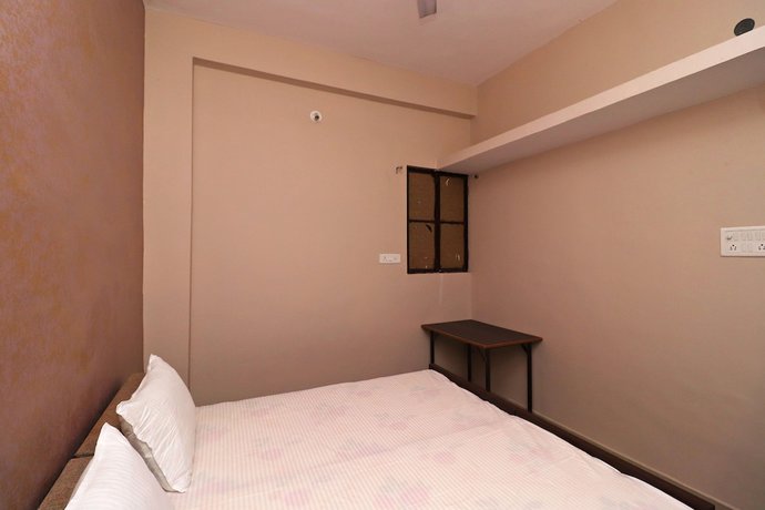 Imagen de la habitación del Hotel SPOT ON 37467 Shivram. Foto 7