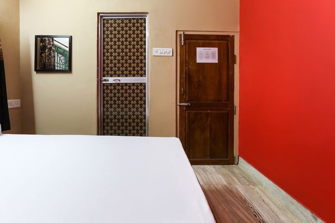 Imagen de la habitación del Hotel SPOT ON 38541 Nirmalya\'s Maharaja. Foto 11