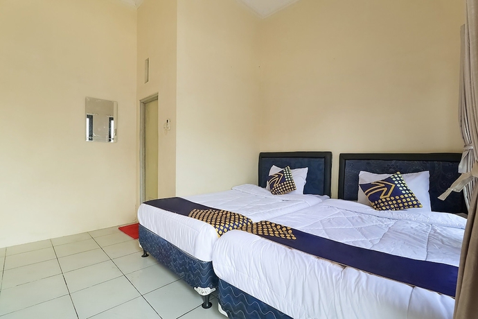 Imagen de la habitación del Hotel SPOT ON 3859 Sweet Candy 2. Foto 8