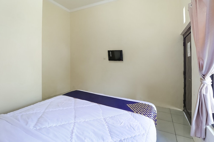 Imagen de la habitación del Hotel SPOT ON 3859 Sweet Candy 2. Foto 11