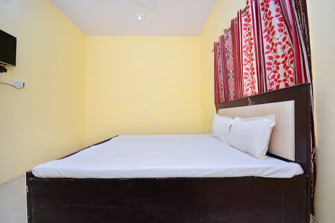 Imagen de la habitación del Hotel SPOT ON 38845 Gursimran Complex. Foto 2