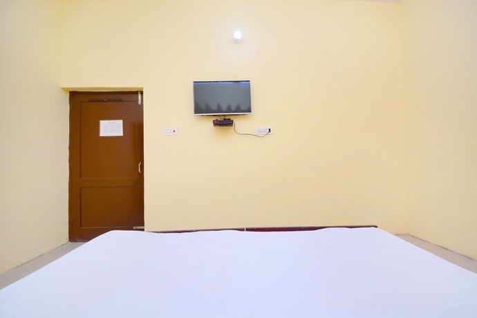 Imagen de la habitación del Hotel SPOT ON 38845 Gursimran Complex. Foto 3