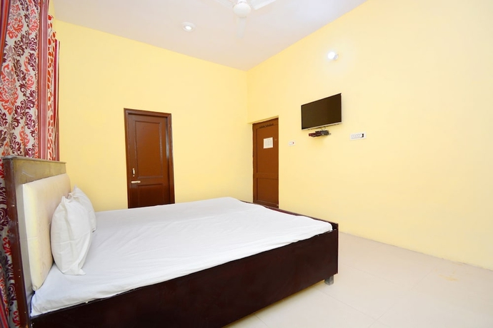 Imagen de la habitación del Hotel SPOT ON 38845 Gursimran Complex. Foto 4