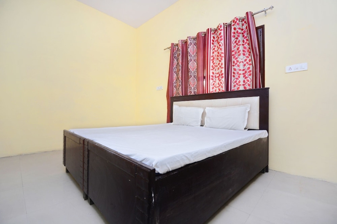 Imagen de la habitación del Hotel SPOT ON 38845 Gursimran Complex. Foto 5