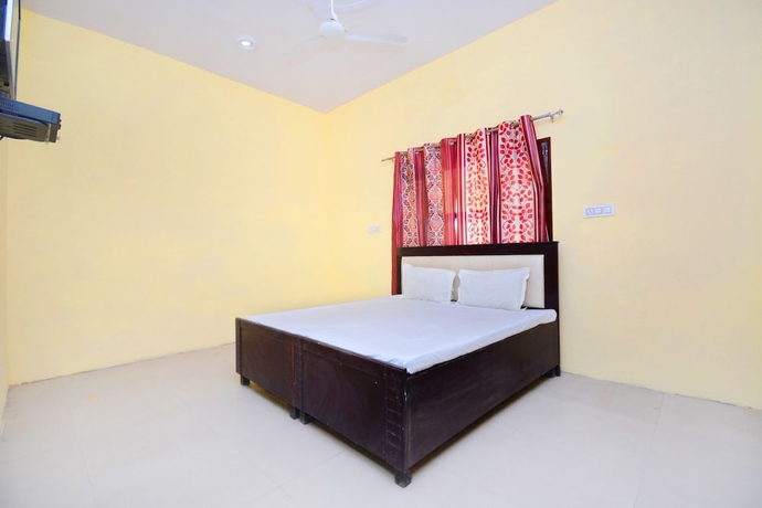 Imagen de la habitación del Hotel SPOT ON 38845 Gursimran Complex. Foto 6