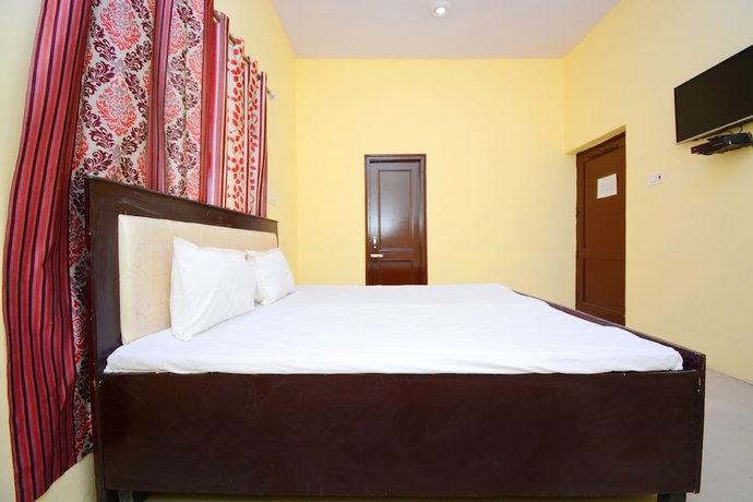 Imagen de la habitación del Hotel SPOT ON 38845 Gursimran Complex. Foto 7