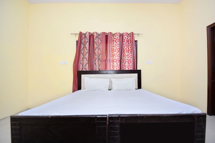 Imagen de la habitación del Hotel SPOT ON 38845 Gursimran Complex. Foto 8